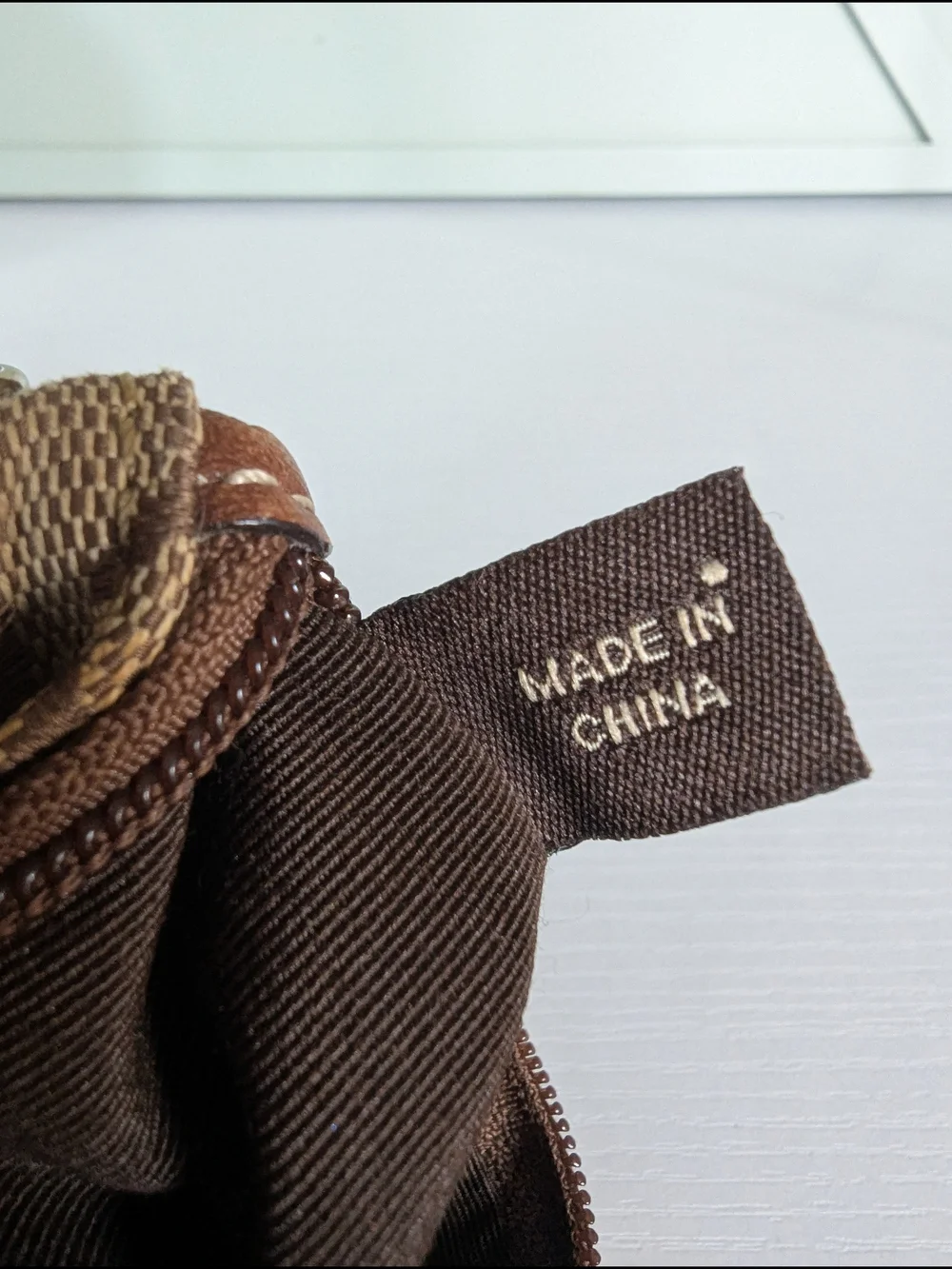 Coach Signature Canvas Wristlet in Brown and Tan